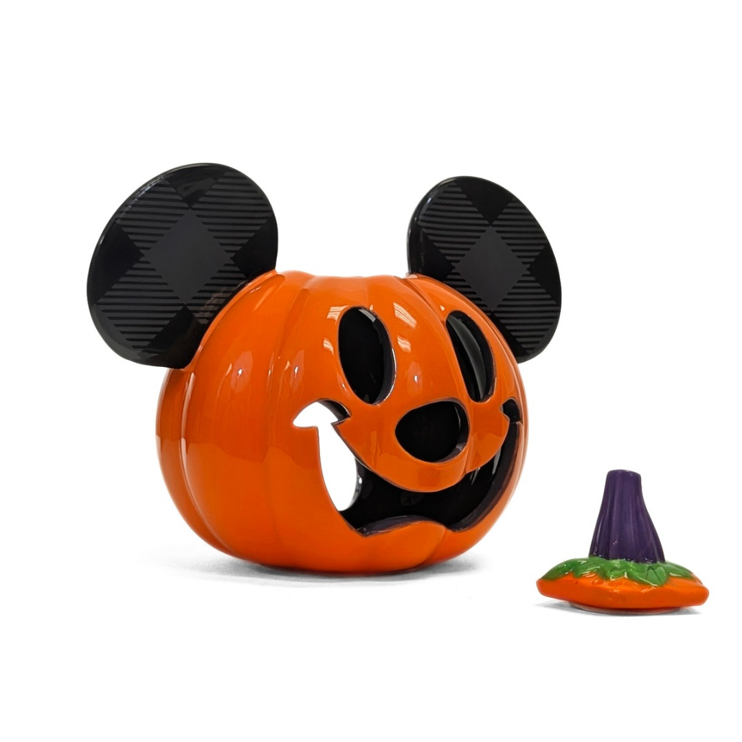 Pumpkin-shaped toy with Mickey Mouse ears and a small purple witch hat on a white background