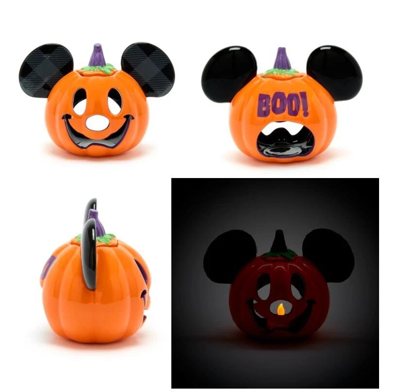 Halloween-themed pumpkins with Mickey Mouse ears and a 'BOO!' design on a white background.